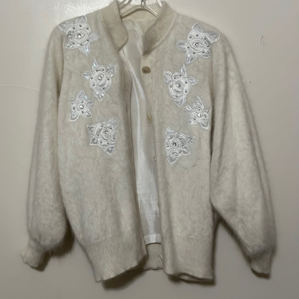 Beautiful lined sweater with jeweled buttons and embroidered flowers. Ap…